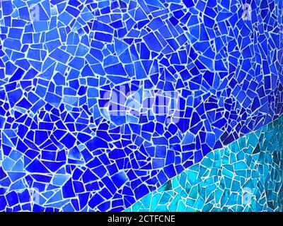 Wall of blue broken tiles mosaic. Stock Photo