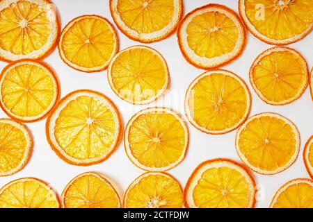 Dried orange slices close-up on the white background Stock Photo