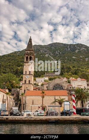 Perast historic town at Kotor bay. Ancient city in Montenegro. Chapel with a bell tower in center of Perast. Stock Photo