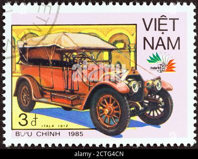 VIETNAM - CIRCA 1985: A stamp printed in North Vietnam from the 'Italia '85 International Stamp Exhibition, Rome' issue shows Itala, 1912. Stock Photo