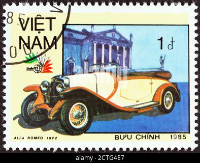 VIETNAM - CIRCA 1985: A stamp printed in North Vietnam from the 'Italia '85 International Stamp Exhibition, Rome' issue shows Alfa Romeo, 1922. Stock Photo