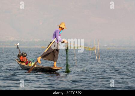 Intha traditional leg rowing fisherman on Inle lake, Burma, Myanmar Stock Photo