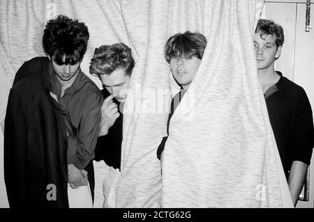 pete-de-freitas-from-echo-the-bunnymen-during-a-photoshoot-in-a-hotel