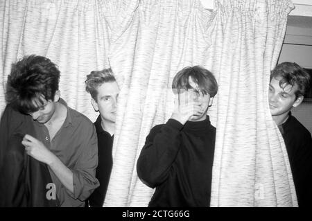 pete-de-freitas-from-echo-the-bunnymen-during-a-photoshoot-in-a-hotel