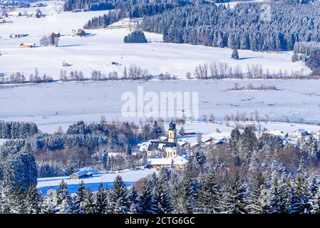 Fresh new snow and a cold winter afternoon in the Allgäu - impressions from the Bavarian foothills of the Alps near Rottachsee Stock Photo