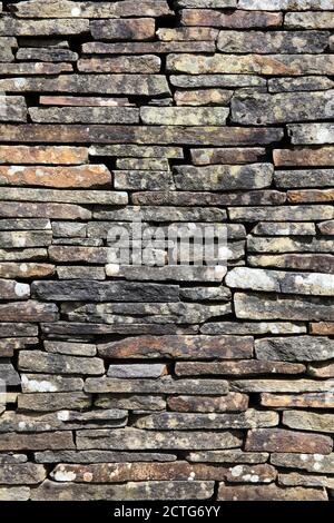 Old weathered brown dry stone brick wall texture backgound stock photo image Stock Photo