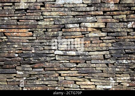 Old weathered brown dry stone brick wall texture backgound stock photo image Stock Photo