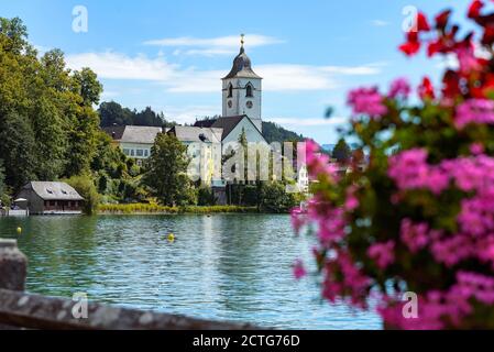 Sankt Wolfgang town in the lake shore of Wolfgang lake. Historical little town where start the cog-railway to Schafberg hilltop Stock Photo