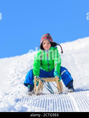 Funny afternoon in wintertime on sleigh Stock Photo