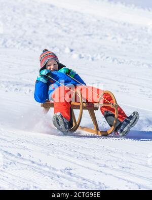 Funny afternoon in wintertime on sleigh Stock Photo