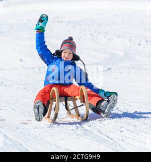 Funny afternoon in wintertime on sleigh Stock Photo