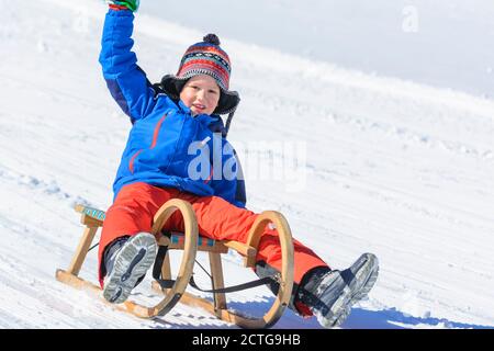 Funny afternoon in wintertime on sleigh Stock Photo