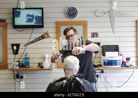 Barber Steve Compton, Shields Road, Byker, Newcastle. Stock Photo