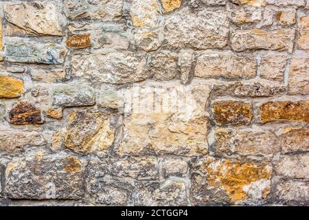 Old rustic wall as a natural stone Stock Photo