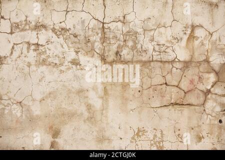 white wall with cracks. gray cement floor cracked Stock Photo