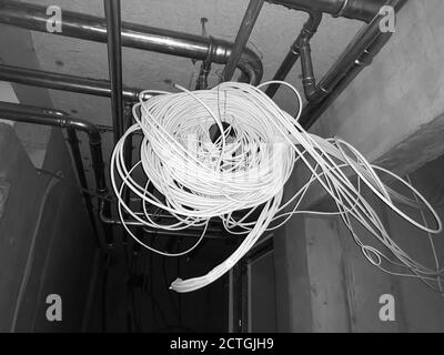 Electric Cable Hanging From the Roof in Switzerland. Stock Photo