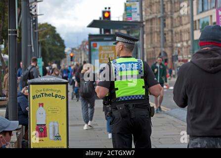 Edinburgh, Scotland, UK. 23 September 2020. Six months to the day since Covid -19 Lockdown came into force in UK and rules and restrictions are still being increased on people gathering together. Consistent Police presence on the street of the city, often walking the beat as opposed to sitting in a vehicle. Stock Photo
