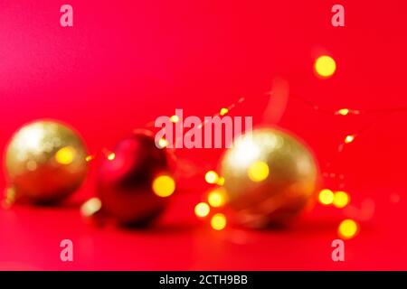 Christmas decorations on a red background with soft focus. Stock Photo