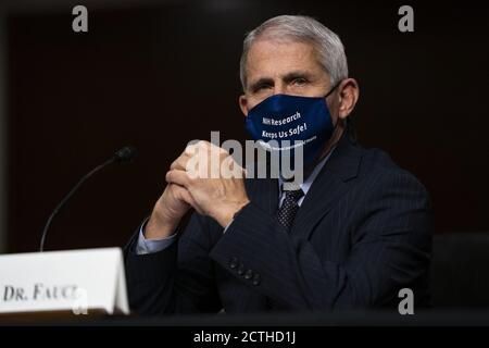 Washington, United States. 23rd Sep, 2020. Dr. Anthony Fauci Director, National Institute of Allergy and Infectious Diseases, National Institutes of Health, prepares to testify during a U.S. Senate Senate Health, Education, Labor, and Pensions Committee Hearing to examine COVID-19, focusing on an update on the federal response at the U.S. Capitol on Wednesday, September 23, 2020 in Washington, DC. Pool photo by Alex Edelman/UPI Credit: UPI/Alamy Live News