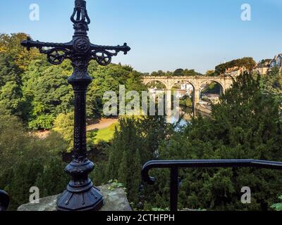 Old lamp standard and railway viaduct over the River Nidd a listed building in Knaresborough North Yorkshire England Stock Photo