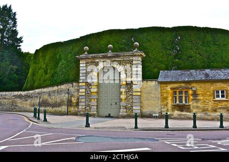 The tallest yew tree hedge in Britain outside the country house Cirencester Park, the home of the Bathurst family. Located close to the town centre. Stock Photo