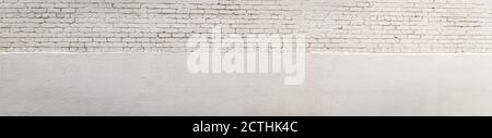 Long panorama of white brick split with white stucco, creative dual copy space, horizontal aspect Stock Photo