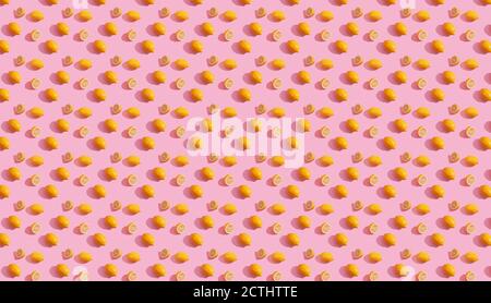 Trendy isometric Seamless continuous pattern of yellow lemons on pink background. Minimalist concept of fresh citrus fruit Stock Photo