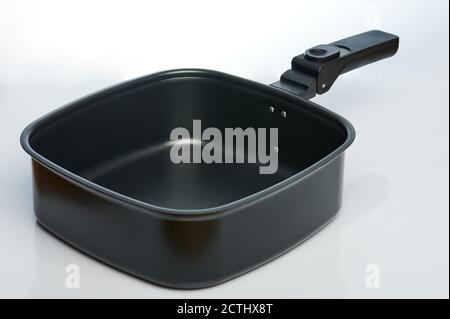Black iron fry pan isometric view isolated on studio background Stock Photo