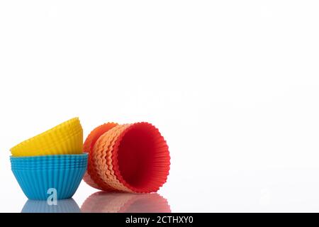 Silicone baking cups cupcake liners muffin molds isolated on white background Stock Photo