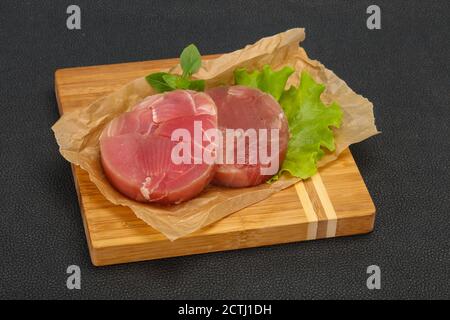 Raw tuna round steak ready for grill Stock Photo