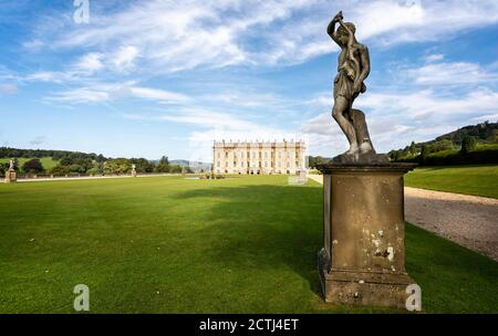 Marble statues on the lawn in front of the southern face of Chatsworth House in Derbyshire, UK on 13 September 2020 Stock Photo