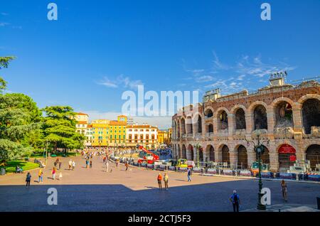 Verona, Italy, September 12, 2019: Piazza Bra square in historical city centre with Verona Arena Roman amphitheater Arena di Verona and colorful multicolored buildings, Veneto Region, Northern Italy Stock Photo