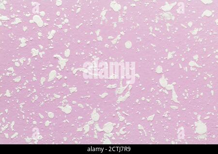 Decorative plaster. Finishing off painted wall by particle white plaster. Textured background Stock Photo
