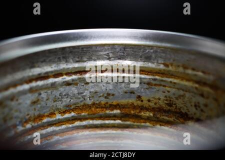 Makro closeup inside metal food can with rusty corroded surface Stock Photo