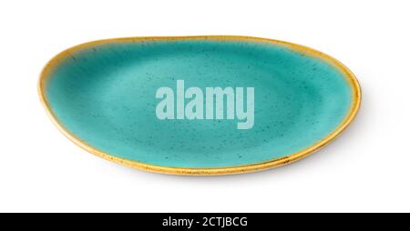 Side view of oval turquoise ceramic plate with yellow border isolated on a white background. Empty crockery for food design. Modern clay, ceramics. Stock Photo
