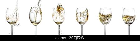 Set of six glasses with splashes of white wine on a white isolated background Stock Photo