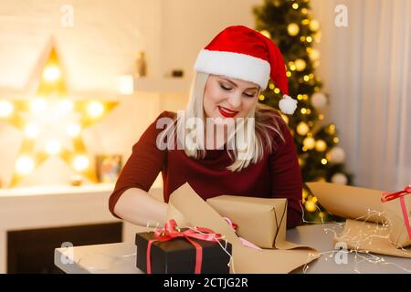 Closeup on table where woman making Christmas decorations. Upper view Stock Photo