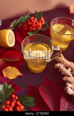 Autumnal composition with two cups of ginger tea Stock Photo