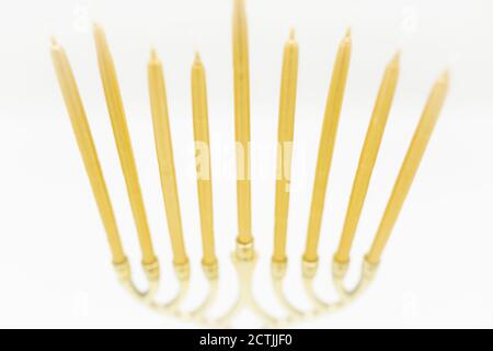 View from Above of Gold Chanukah candles in Menorah Stock Photo