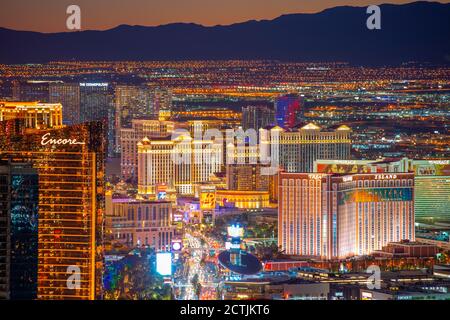 Luxury hotels including Wynn, Encore, Caesars Palace, Treasure Island at night from top of the Stratosphere Tower in Las Vegas, Nevada, USA. Stock Photo