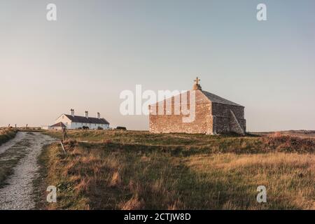 St. Aldhelm’s Chapel - a small built during the 12th century church at St. Aldhelm’s Head near Swanage on the Jurassic Coast, Dorset, England, UK Stock Photo