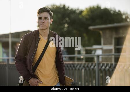 Handsome young man wearing casuals in city Stock Photo