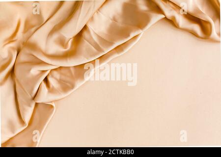 The golden silk fabric background. High quality  Stock Photo