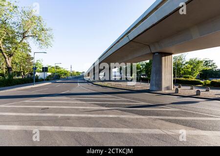 Germany, Berlin, Overpass and empty asphalt road of Berlin Tegel Airport during COVID-19 lockdown Stock Photo