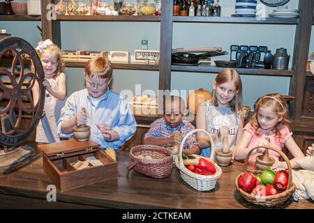 Huntsville Alabama,EarlyWorks Children's Museum,hands on activities old time general store,boy boys girl girls Black African Stock Photo