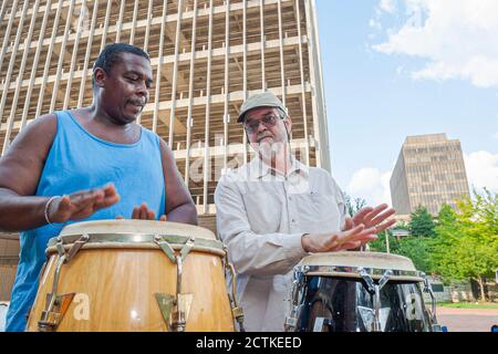 Huntsville Alabama,Big Spring Park,Black African man men friends play playing conga drums, Stock Photo