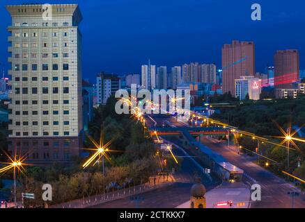 --File--Aerial view of the lighted street of Urumqi city, northwest China's Xinjiang Uyghur autonomous region, 29 July 2020. Stock Photo