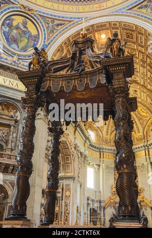 Vatican City State, Europe.  St Peter's altar and Gian Lorenzo Bernini's Baldachin (Baldacchino) - a large Baroque sculpted bronze canopy made of 927 Stock Photo