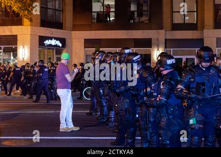 Legal observer at a demonstration notes how people are treated by ...