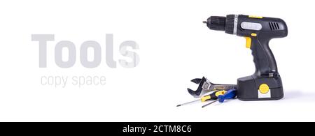 Tools screwdriver electric screwing machine copy space. Tools isloated on white background. Stock Photo